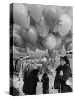 Man Selling Balloons at Dwight D. Eisenhower's Inauguration-Cornell Capa-Stretched Canvas