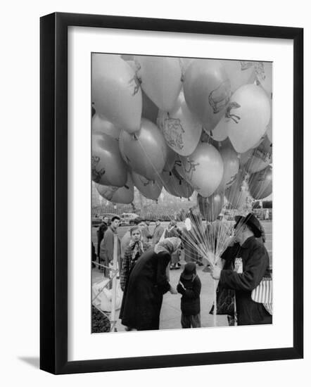 Man Selling Balloons at Dwight D. Eisenhower's Inauguration-Cornell Capa-Framed Premium Photographic Print