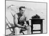 Man Sitting at the Beach with His Typewriter-null-Mounted Photo