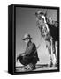 Man Sitting Holding His Horses Reins-Loomis Dean-Framed Stretched Canvas