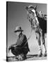 Man Sitting Holding His Horses Reins-Loomis Dean-Stretched Canvas