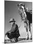 Man Sitting Holding His Horses Reins-Loomis Dean-Mounted Photographic Print