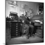 Man Sitting in His Office-null-Mounted Photographic Print