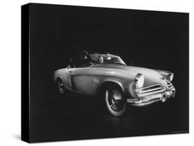 Man Sitting in the 1953 Starliner Studebaker Which is Capable Of Taking Sharp Curves at High Speed-Howard Sochurek-Stretched Canvas