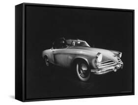 Man Sitting in the 1953 Starliner Studebaker Which is Capable Of Taking Sharp Curves at High Speed-Howard Sochurek-Framed Stretched Canvas