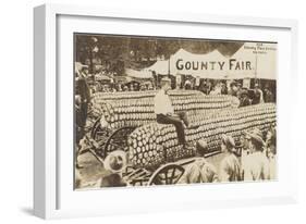 Man Sitting on Giant Ear of Corn-null-Framed Art Print