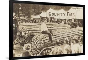 Man Sitting on Giant Ear of Corn-null-Framed Art Print