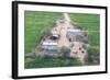 Man Sitting on House Roof in Tiny Agricultural Hamlet Amidst Fields of Vegetables, Rajasthan, India-Annie Owen-Framed Photographic Print