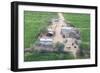 Man Sitting on House Roof in Tiny Agricultural Hamlet Amidst Fields of Vegetables, Rajasthan, India-Annie Owen-Framed Photographic Print