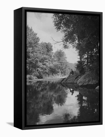 Man Sitting on the Bank of the Upper Opalescent River, a Branch of the Hudson-Margaret Bourke-White-Framed Stretched Canvas