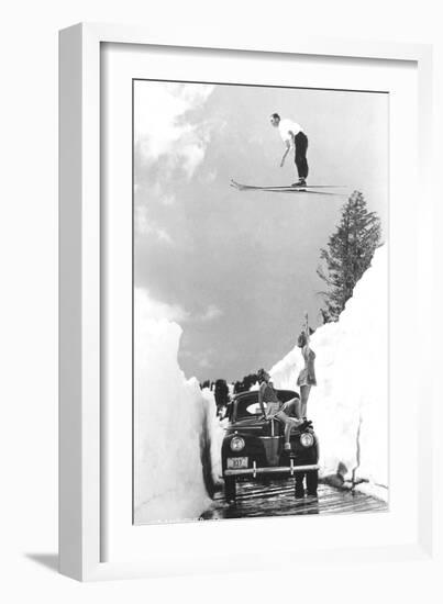 Man Ski-Jumping over Road-null-Framed Art Print