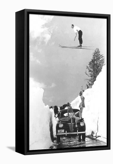 Man Ski-Jumping over Road-null-Framed Stretched Canvas