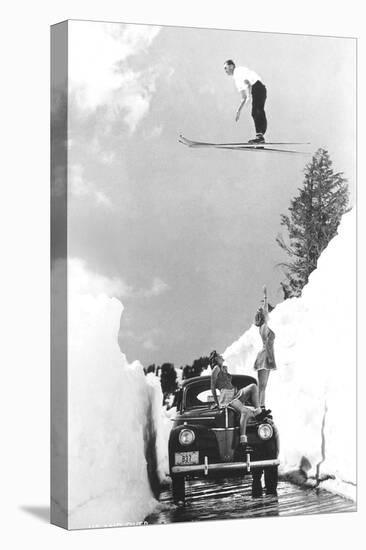 Man Ski-Jumping over Road-null-Stretched Canvas