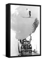 Man Ski-Jumping over Road-null-Framed Stretched Canvas