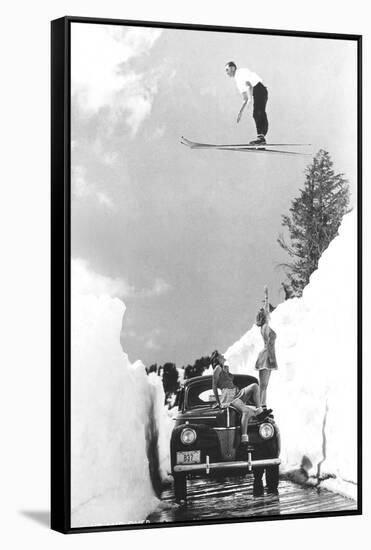 Man Ski-Jumping over Road-null-Framed Stretched Canvas