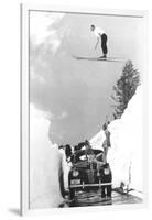 Man Ski-Jumping over Road-null-Framed Art Print