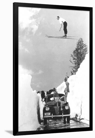 Man Ski-Jumping over Road-null-Framed Art Print