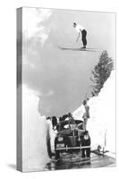 Man Ski-Jumping over Road-null-Stretched Canvas