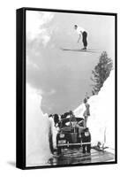 Man Ski-Jumping over Road-null-Framed Stretched Canvas