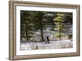 Man Skins On A Snowy Forest Service Road Next To The Gallatin River Near Big Sky, Montana-Hannah Dewey-Framed Photographic Print