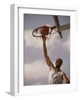 Man Slam-Dunking a Basketball-null-Framed Photographic Print