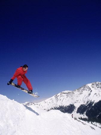 Airborne Snowboarder