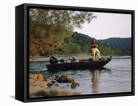Man Standing in a Boat Fishing-null-Framed Stretched Canvas