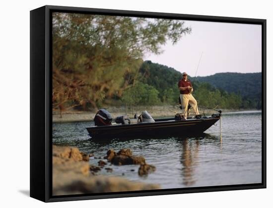 Man Standing in a Boat Fishing-null-Framed Stretched Canvas