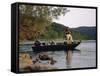 Man Standing in a Boat Fishing-null-Framed Stretched Canvas