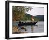 Man Standing in a Boat Fishing-null-Framed Photographic Print