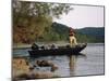 Man Standing in a Boat Fishing-null-Mounted Photographic Print