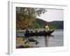 Man Standing in a Boat Fishing-null-Framed Photographic Print