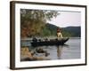 Man Standing in a Boat Fishing-null-Framed Photographic Print