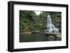 Man Standing next to Huge Tropical Jungle Waterfall in Okinawa, Japan-Sam Spicer-Framed Photographic Print