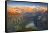 Man standing on rocks looking at clouds at sunset over lake Limmernsee, aerial view-Roberto Moiola-Framed Stretched Canvas