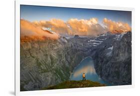 Man standing on rocks looking at clouds at sunset over lake Limmernsee, aerial view-Roberto Moiola-Framed Photographic Print