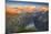 Man standing on rocks looking at clouds at sunset over lake Limmernsee, aerial view-Roberto Moiola-Mounted Photographic Print