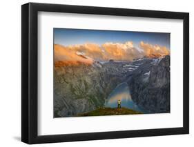 Man standing on rocks looking at clouds at sunset over lake Limmernsee, aerial view-Roberto Moiola-Framed Photographic Print