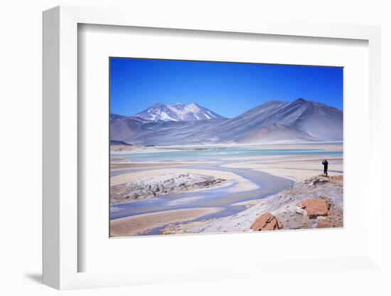 Man Standing on Rocks Looking over Miscanti Laguna, Turquoise Mineral Lake, San Pedro De Atacama-Kimberly Walker-Framed Photographic Print