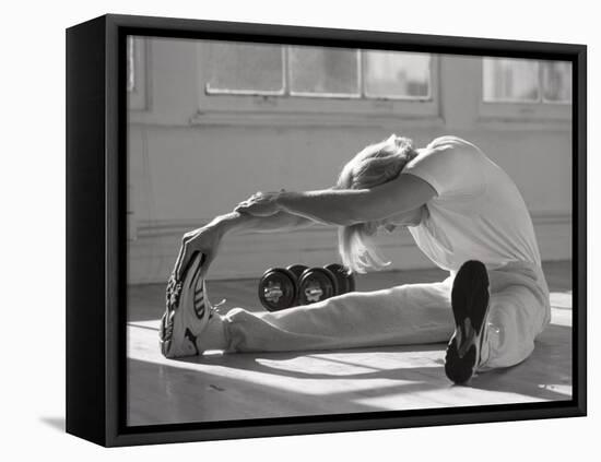 Man Stretching in Gym, New York, New York, USA-Chris Trotman-Framed Stretched Canvas