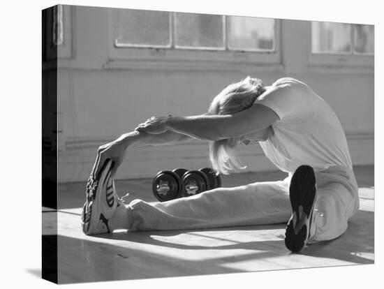 Man Stretching in Gym, New York, New York, USA-Chris Trotman-Stretched Canvas