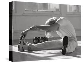 Man Stretching in Gym, New York, New York, USA-Chris Trotman-Stretched Canvas