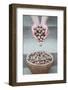 Man Strewing Walnuts into a Bulrush Basket on Stairs-Joe Petersburger-Framed Photographic Print