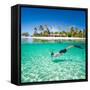 Man Swimming in a Tropical Lagoon in Front of Exotic Island-BlueOrange Studio-Framed Stretched Canvas