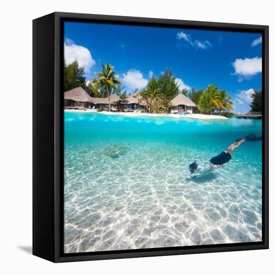 Man Swimming in a Tropical Lagoon in Front of Exotic Island-BlueOrange Studio-Framed Stretched Canvas
