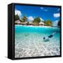 Man Swimming in a Tropical Lagoon in Front of Exotic Island-BlueOrange Studio-Framed Stretched Canvas