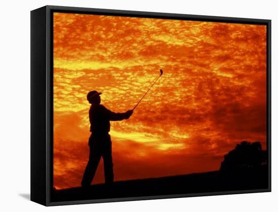 Man Swinging Golf Club at Sunset-Bill Bachmann-Framed Stretched Canvas