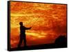 Man Swinging Golf Club at Sunset-Bill Bachmann-Framed Stretched Canvas