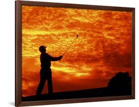 Man Swinging Golf Club at Sunset-Bill Bachmann-Framed Photographic Print