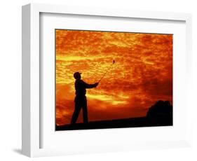 Man Swinging Golf Club at Sunset-Bill Bachmann-Framed Photographic Print